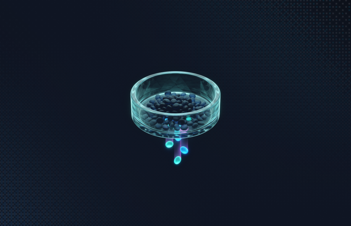 Glass sieve holding dark pebbles while a few glowing pebbles fall through